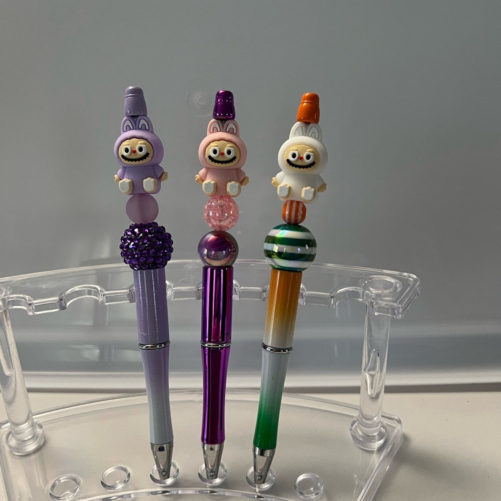 Three Labubu pens